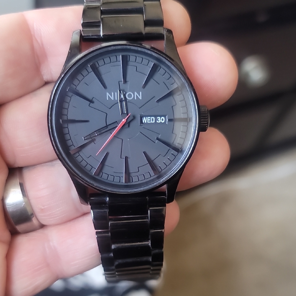 Nixon Black Dial Watch with Red Accent